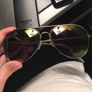 Purple/green tint sunglasses
